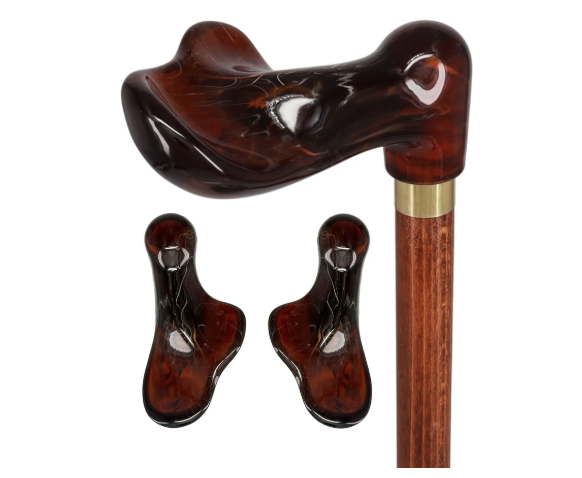 Curved burgundy resin hammer head attached to a wooden cane shaft, with two extra burgundy resin hammer heads placed beside it.