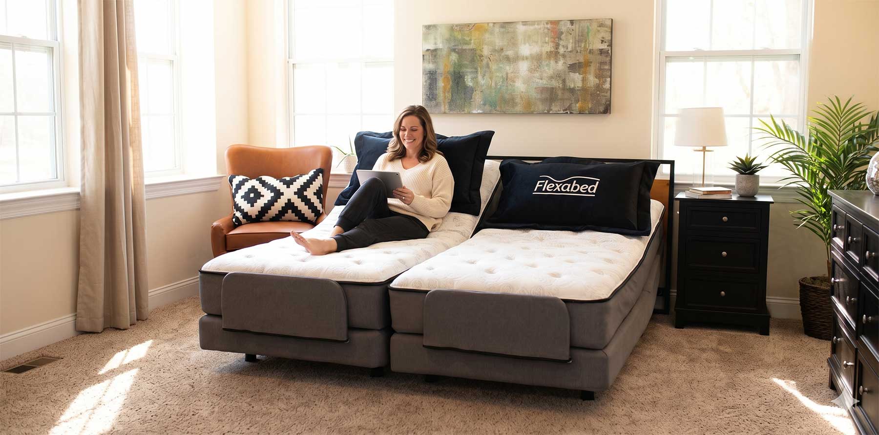 luxury adjustable beds Happy woman sitting on a luxury, adjustable, king-size bed