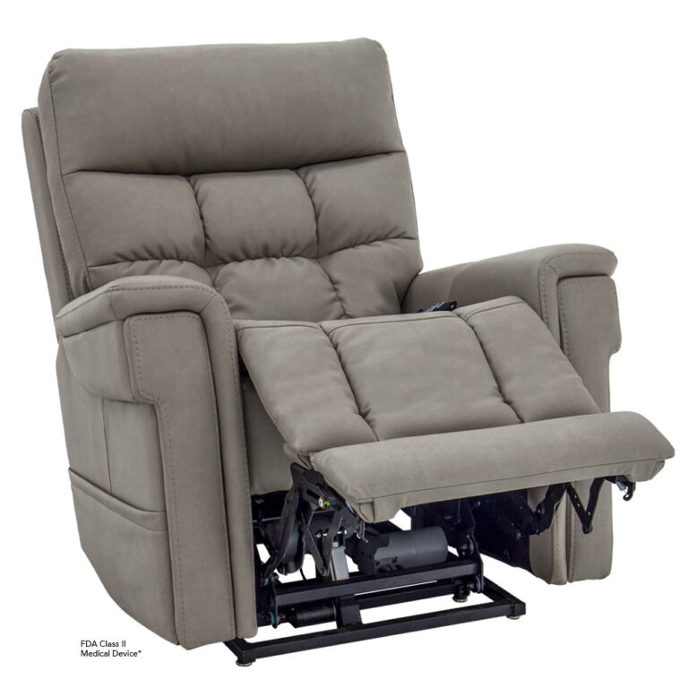 Gray power-reclining chair with extended footrest; mechanical frame visible beneath the seat, intended for medical use.