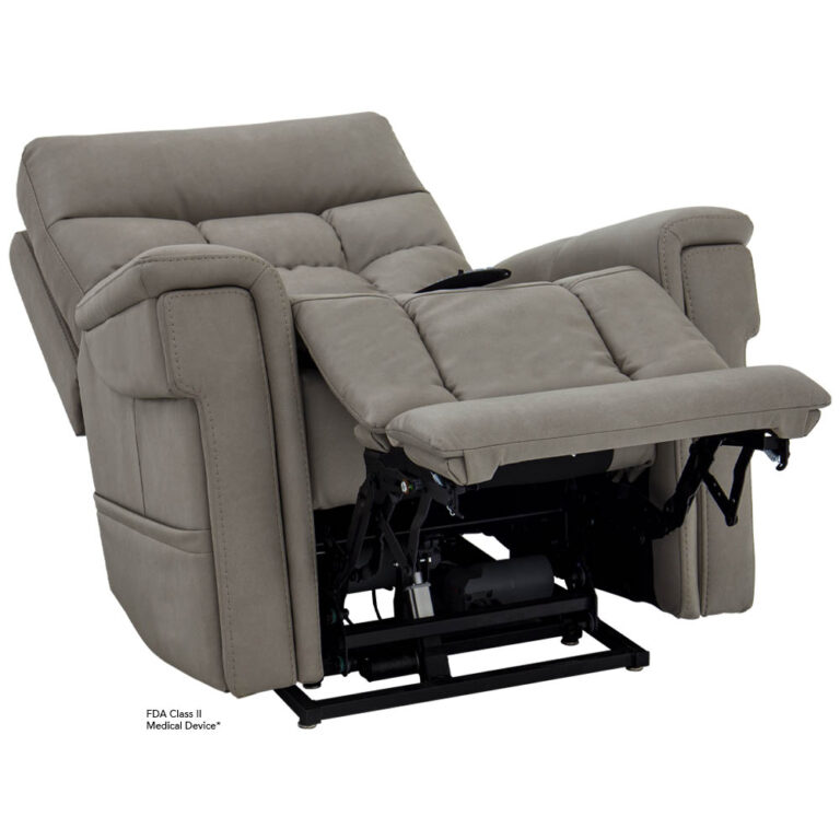 Beige upholstered reclining chair with extended footrest and visible metal reclining frame.