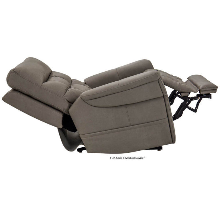 Gray reclining chair fully extended with leg rest raised, shown on a white background (medical-use recliner).